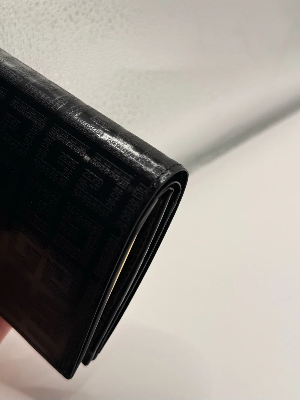 Vintage Givenchy 4G Monogram Black Leather Logo-Pattern Compact Wallet Pre-Owned